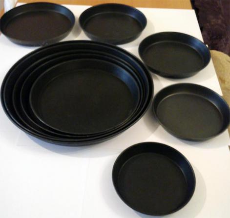 قالب های متفاوت ظروف چدنی پیتزا